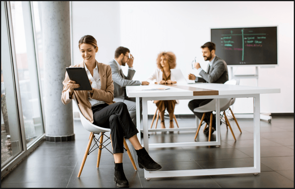 woman with people at desk